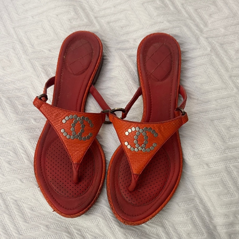 CHANEL Red Leather Sandals with Silver Accents